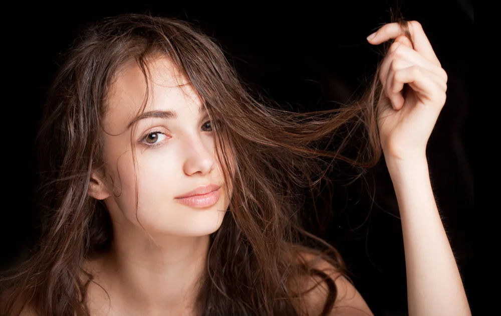 What causes oily hair?